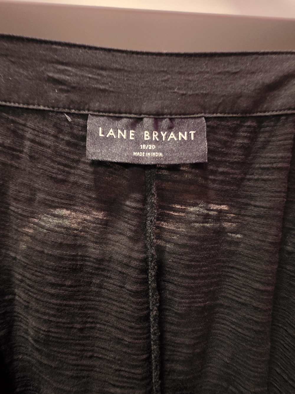 Lane Bryant Black Top With Flower Sleeve Details